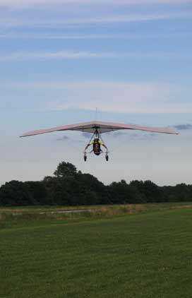Hang Gliding Student Performing a Tandem Landing